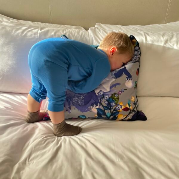 Toddler with face in pillow